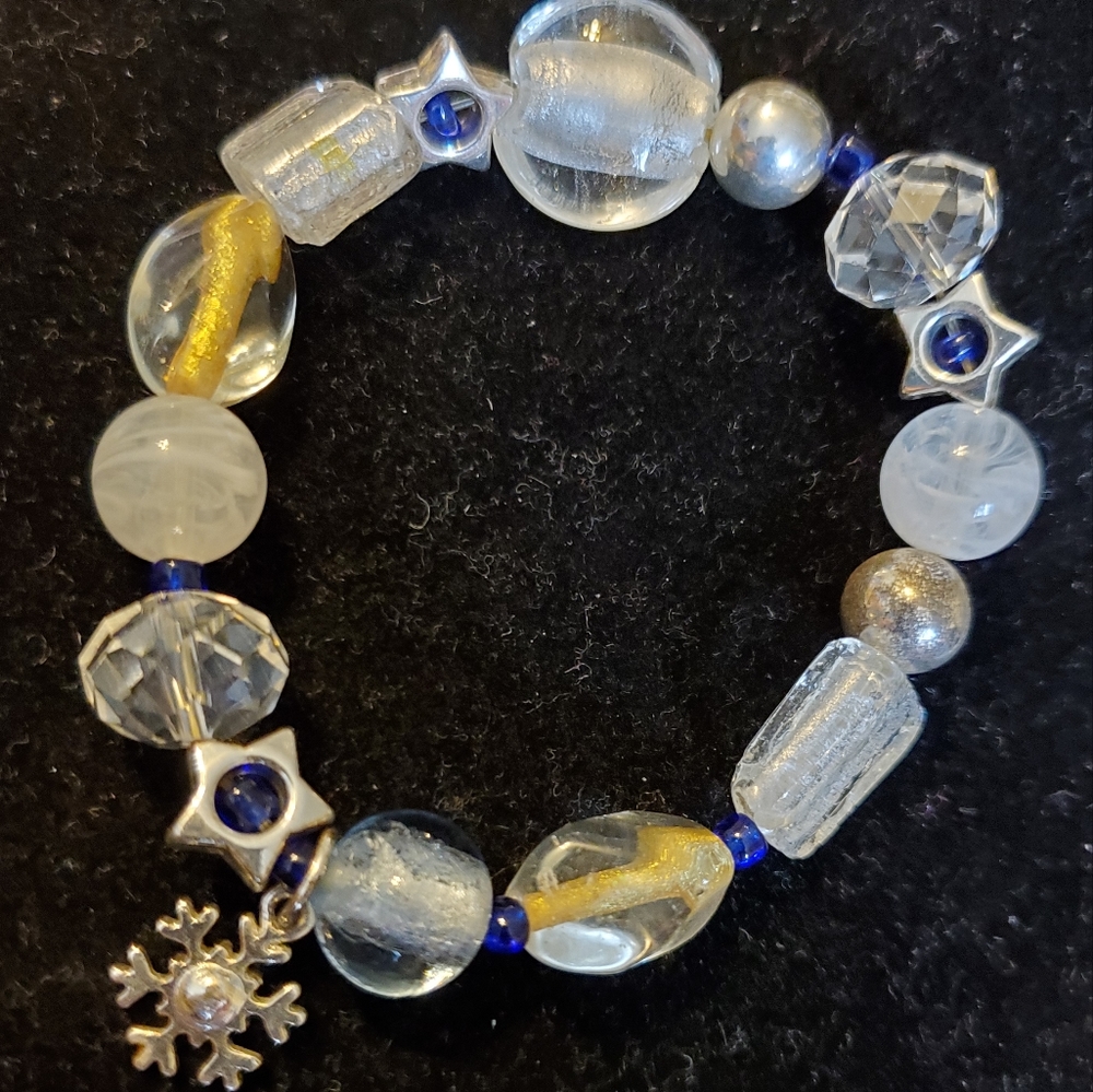 Silvertone chunky snowflake, star beaded stretch bracelet